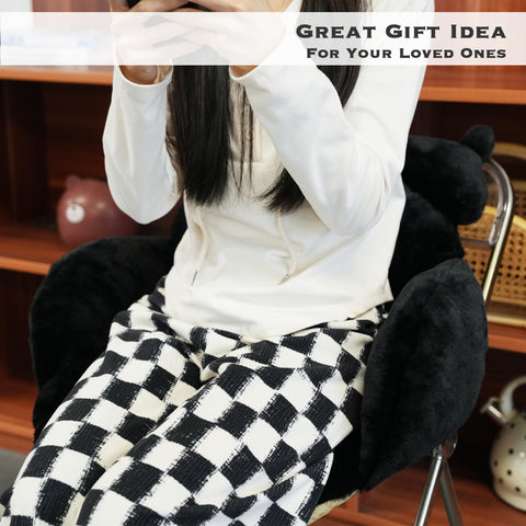 juju GOODS cushion beside book to show scale and portable convenience