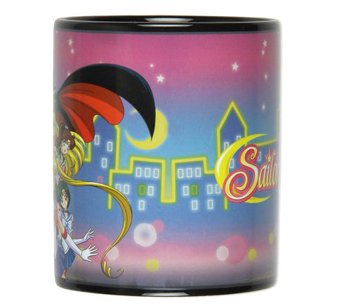 JUST FUNKY mug held by hand to show size and comfortable handle