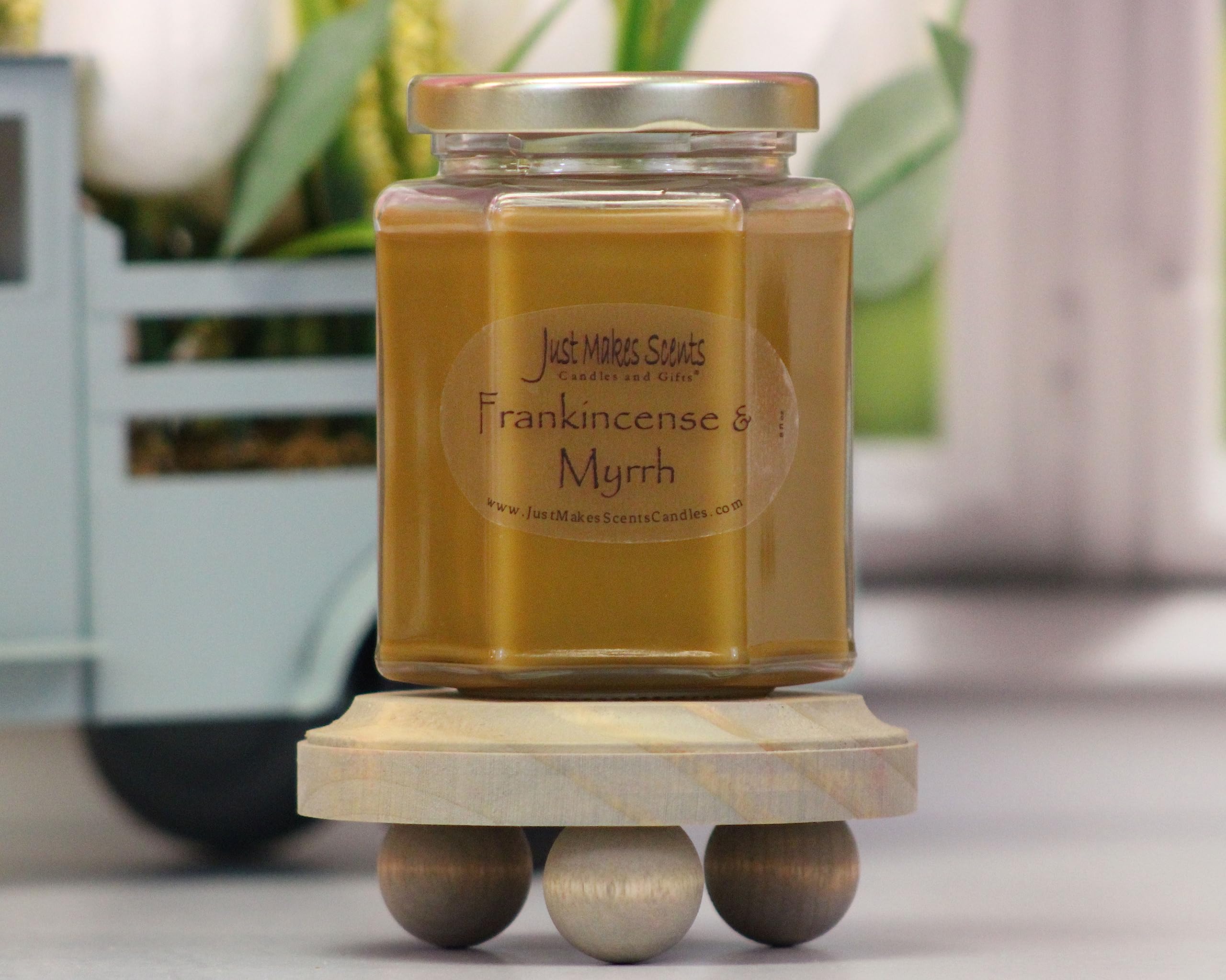 Close-up of Just Makes Scents lid label highlighting handcrafted origin and scent
