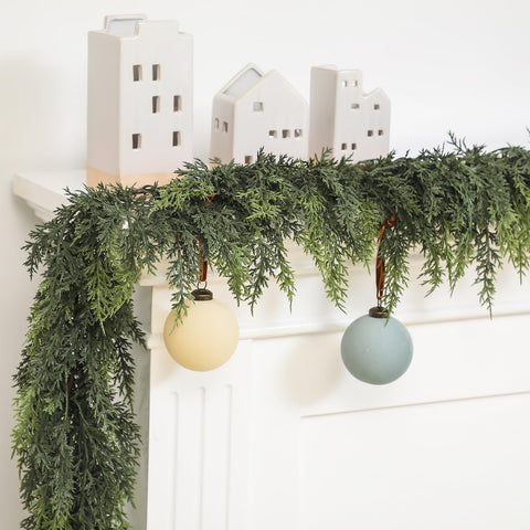 Jutom garland beside ruler showing 9 foot scale for sizing and placement planning