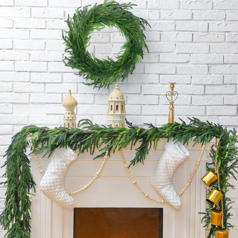 Jutom garland held in hand showing scale and 9-foot length for versatile placement