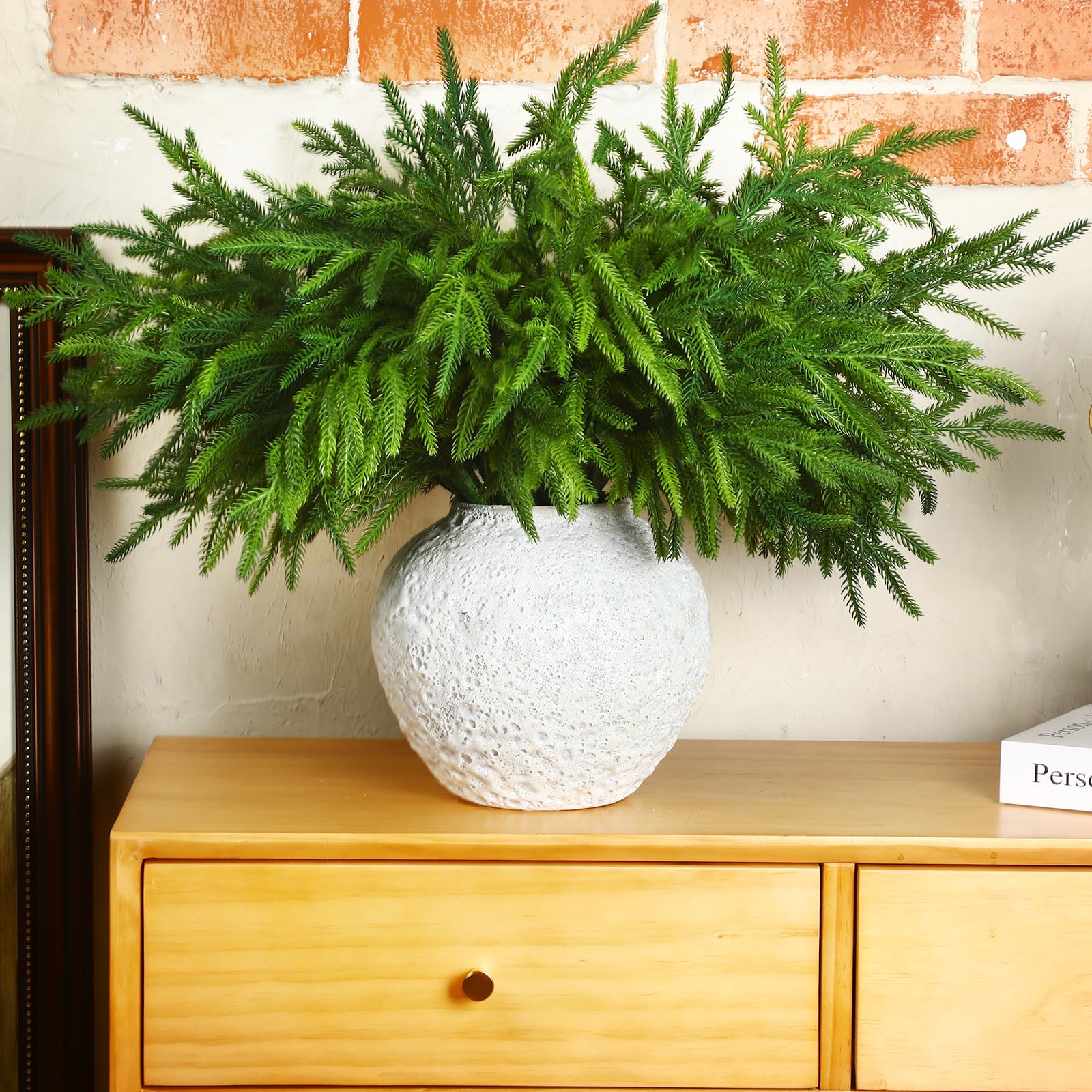 Jutom styled on a fireplace mantel showing festive look and low-maintenance benefit