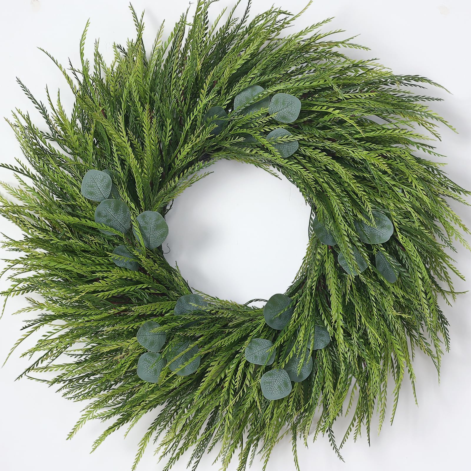 Juxdp wreath on front door showing welcoming curb appeal