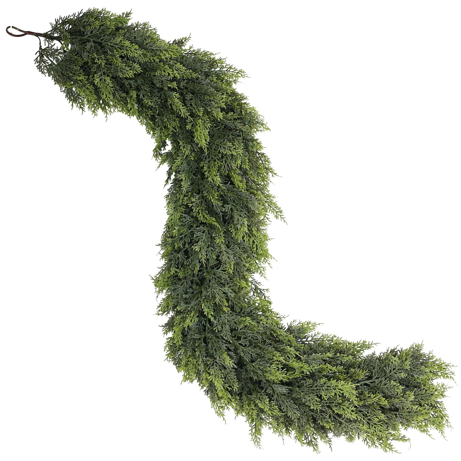 Juxdp garland styled around fireplace creating warm seasonal atmosphere