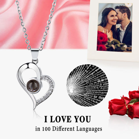 K KYMAKE necklace pendant detail showing 100 languages motif and wearable sentiment