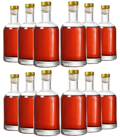 Kaachli clear glass bottles front pack showing neat set and presentation benefit