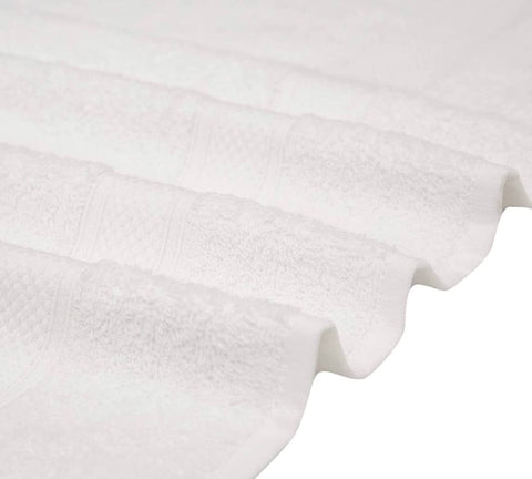 KAHAF COLLECTION towel draped over a spa chair demonstrating quick-dry convenience