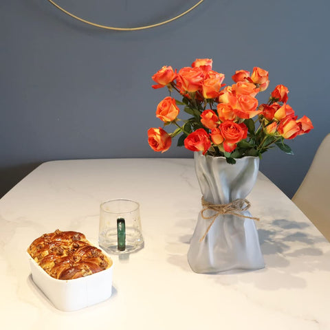 kaitnax vase beside hand showing scale and easy placement advantage