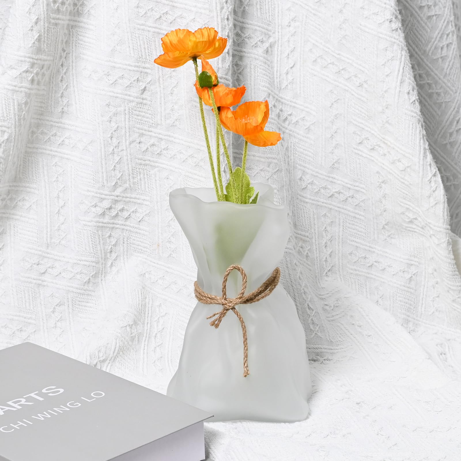 kaitnax vase holding single stem flower for refined focal point