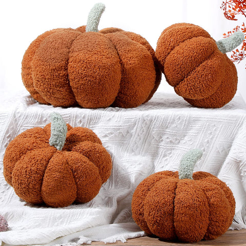 Kajaia pillows styled on a sofa creating an autumnal living room vibe