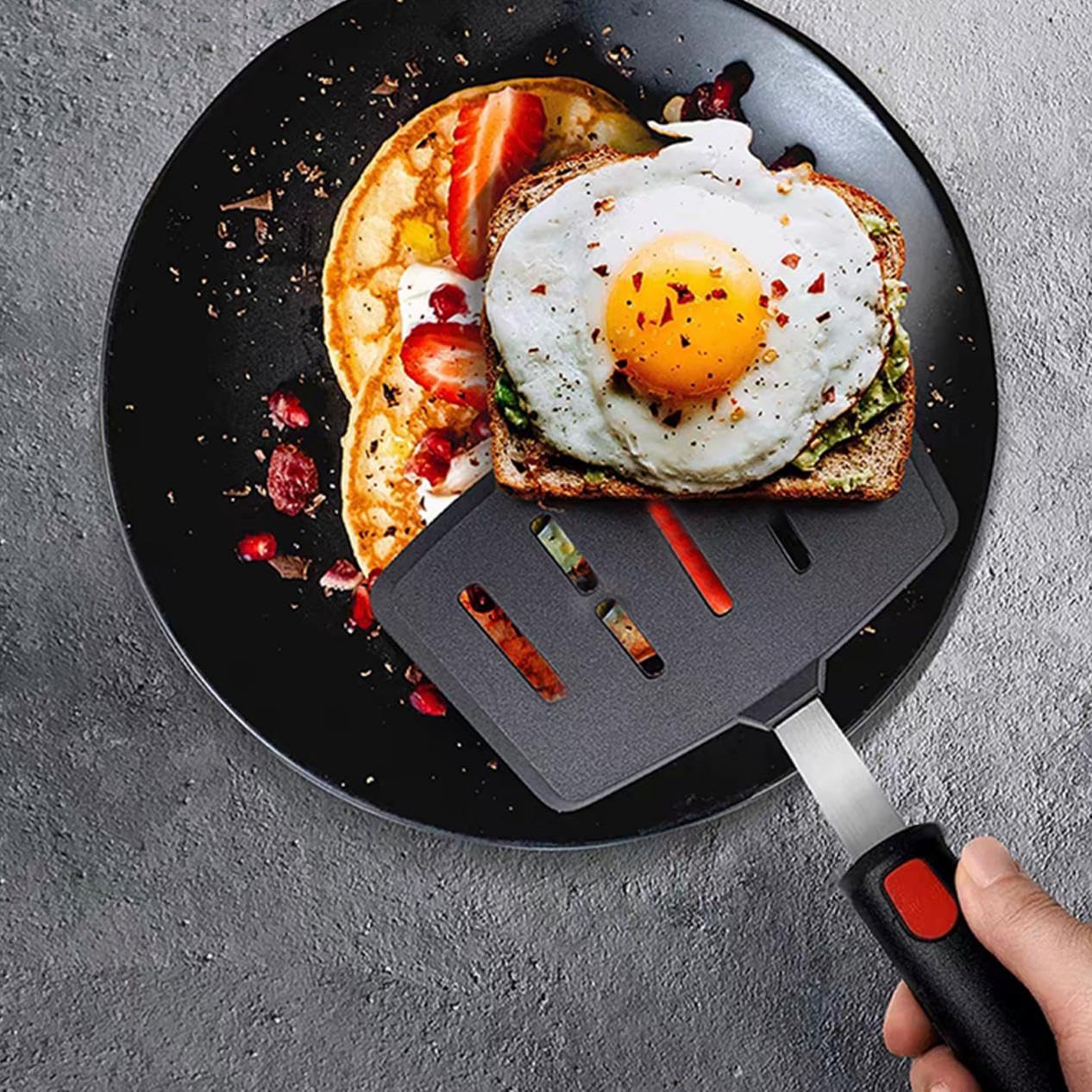 KAKAMINA spatula in use on nonstick pan preventing scratches
