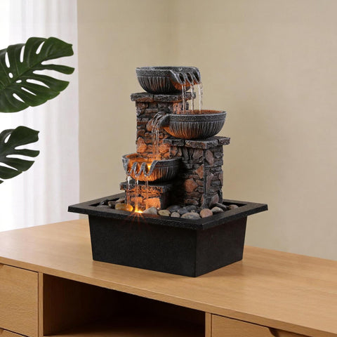 Kalona beside books showing compact size and space-saving benefit