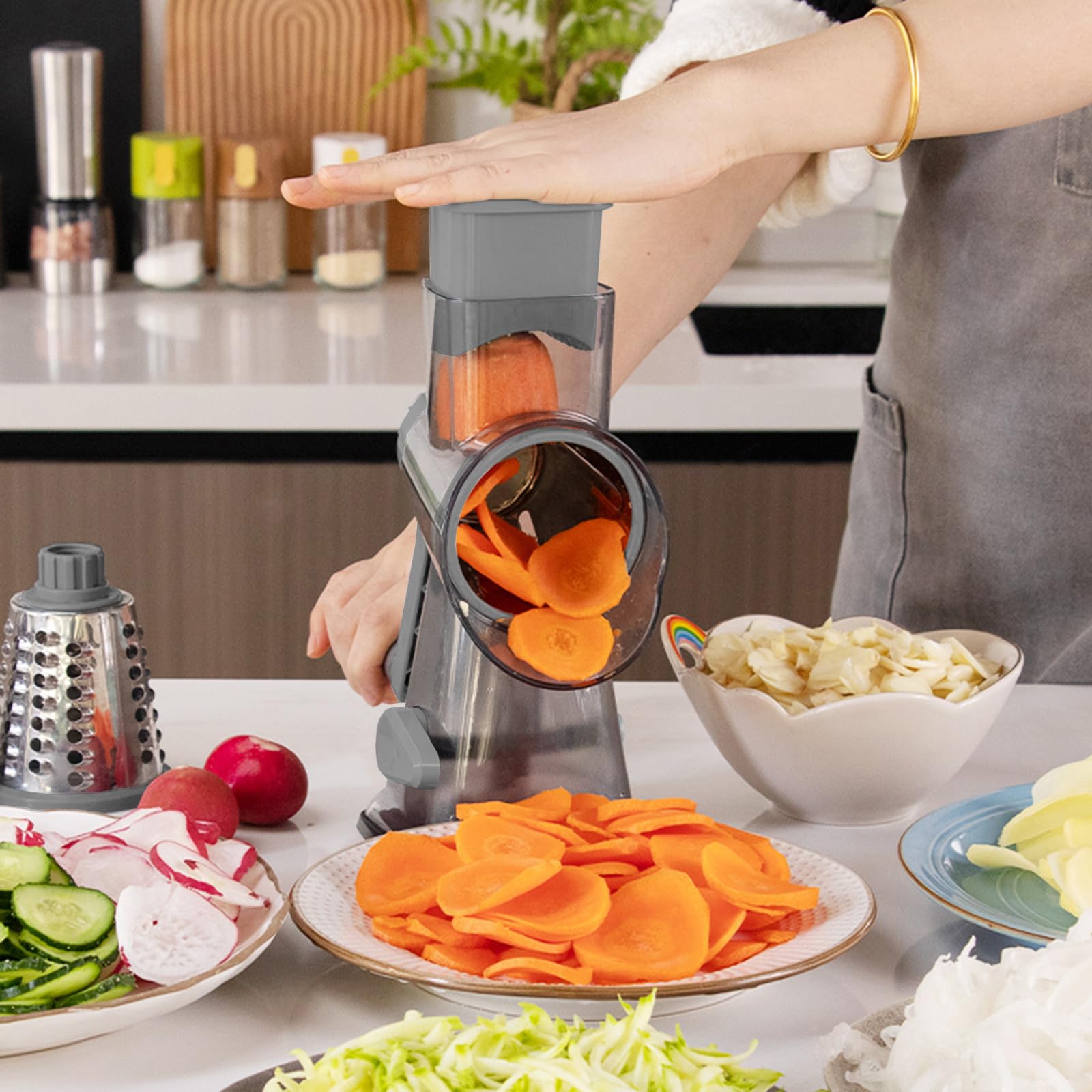 KalraMay beside a hand for scale to show compact size and countertop convenience
