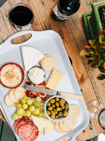 KAQAHIDO tray arranged with charcuterie showing versatility and presentation benefit