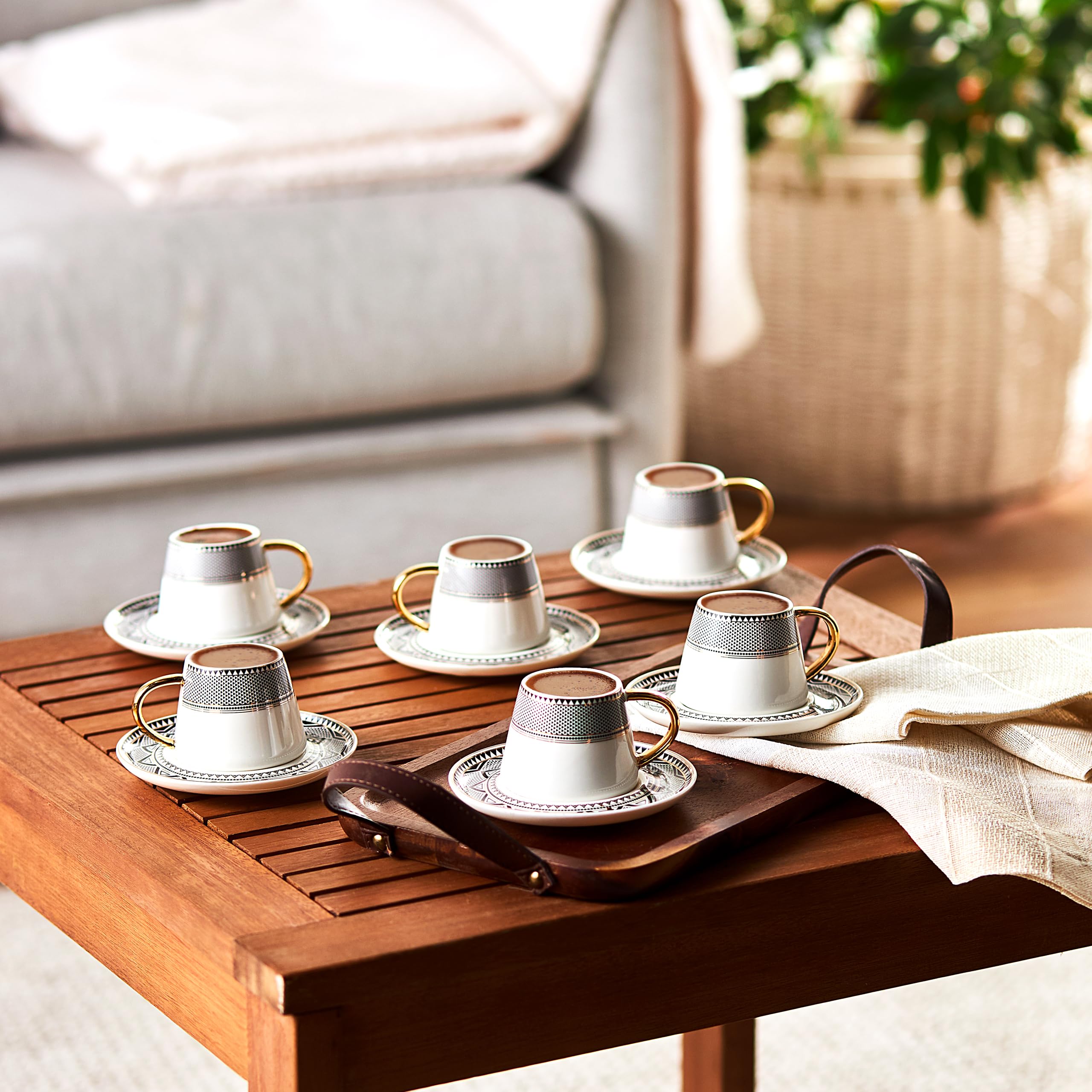 KARACA gold handle detail on cup, offering a luxurious grip and visual accent