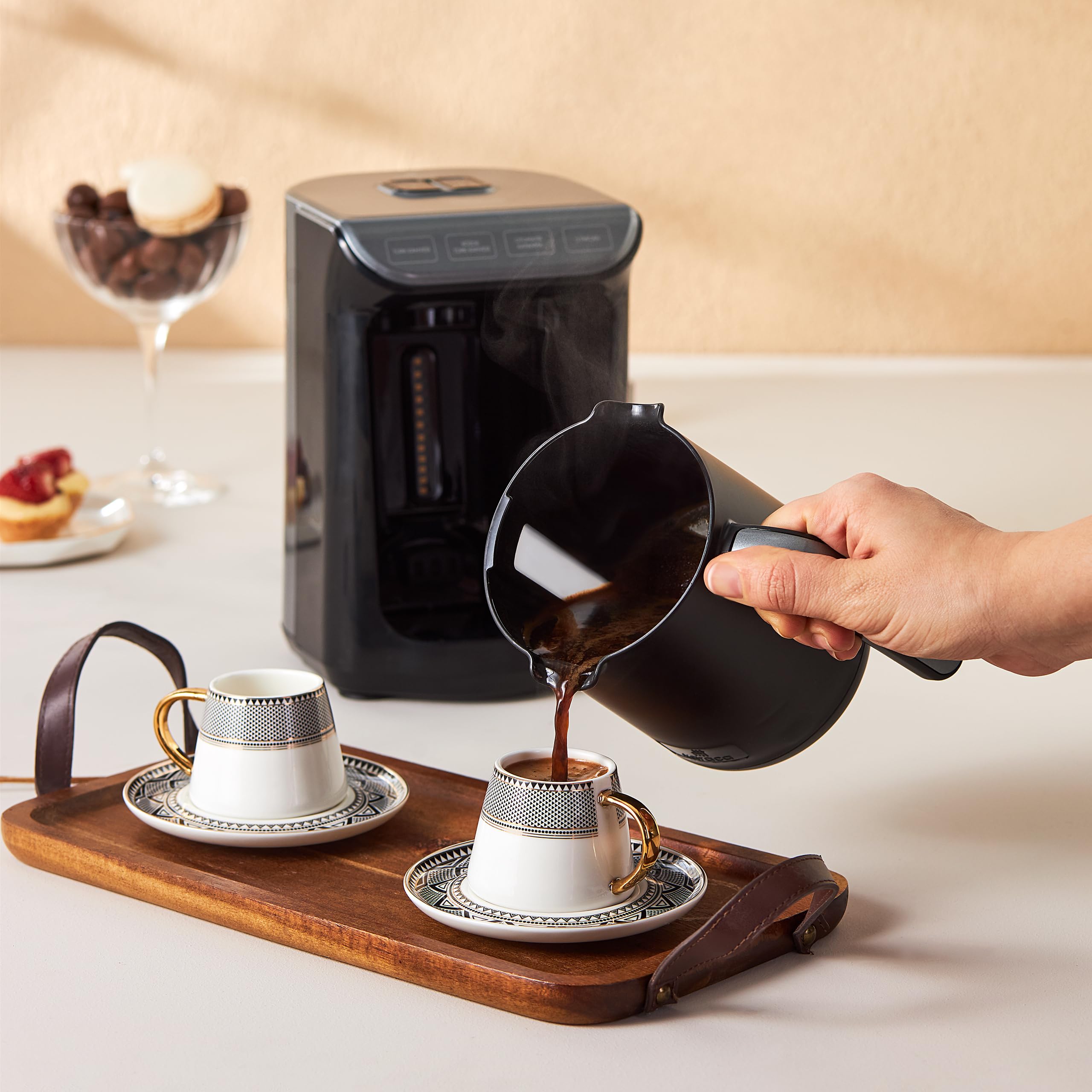 KARACA cup held in hand to show true 2.7 oz scale and comfortable size
