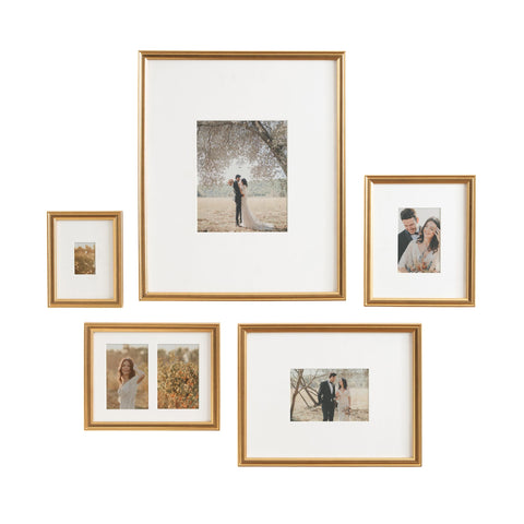 Kate and Laurel Adlynn grouped frames with hanging template showing quick installation benefit