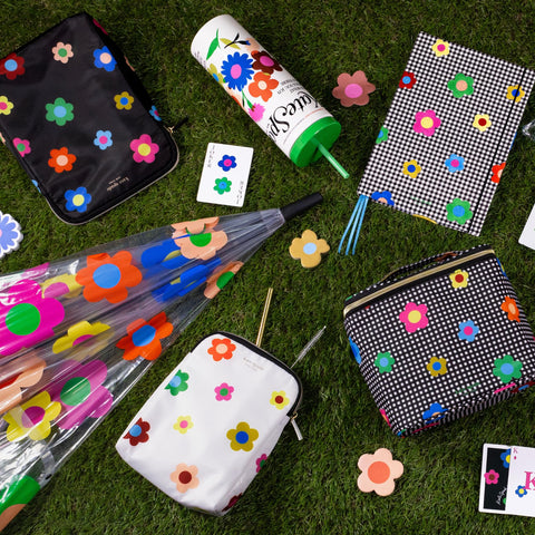 kate spade new york lifestyle picnic scene showing bags in use and stylish-outdoor benefit