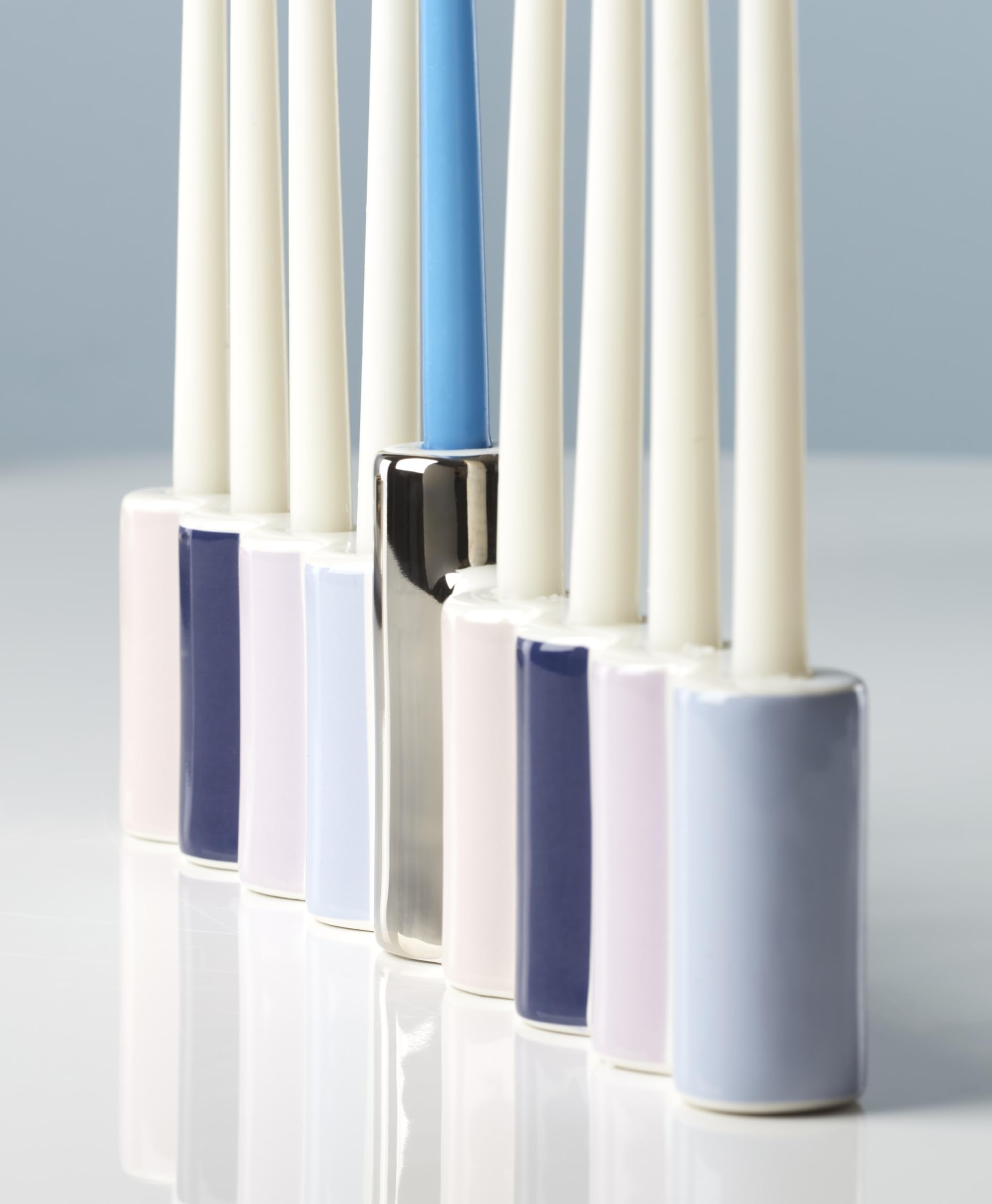 kate spade new york menorah on mantel in a styled holiday setting for visual appeal