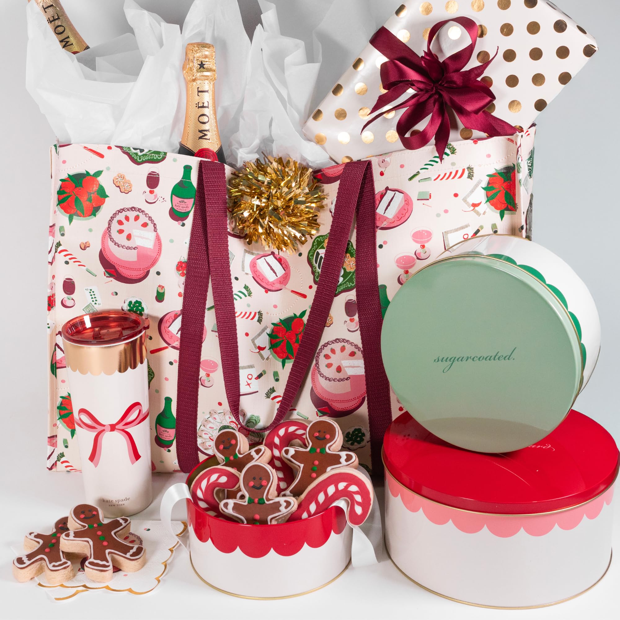 kate spade new york lifestyle shot of tins filled with cookies showing gifting and presentation benefit