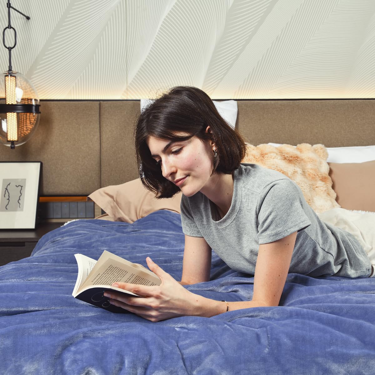 KAWAHOME blanket draped on sofa showing live-use comfort and warmth
