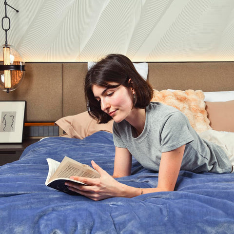 KAWAHOME blanket draped on sofa showing live-use comfort and warmth