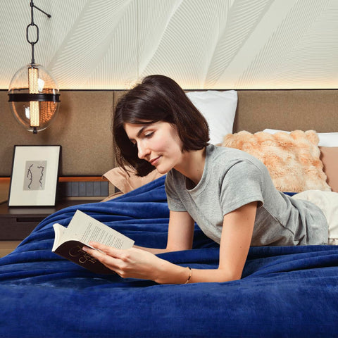KAWAHOME sherpa on styled bed demonstrates layered bedroom warmth and style
