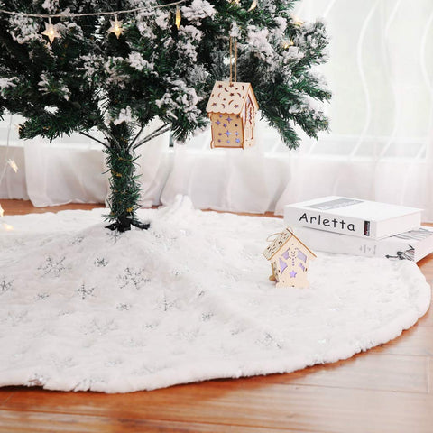 Kaximd front view of silver tree skirt showing full decorative coverage and elegance