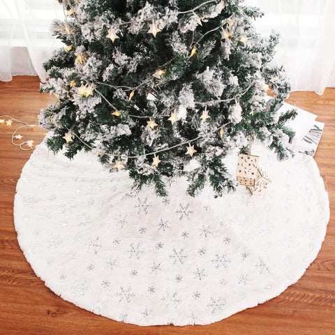 Kaximd tree skirt in living room protecting floor and hiding tree stand neatly
