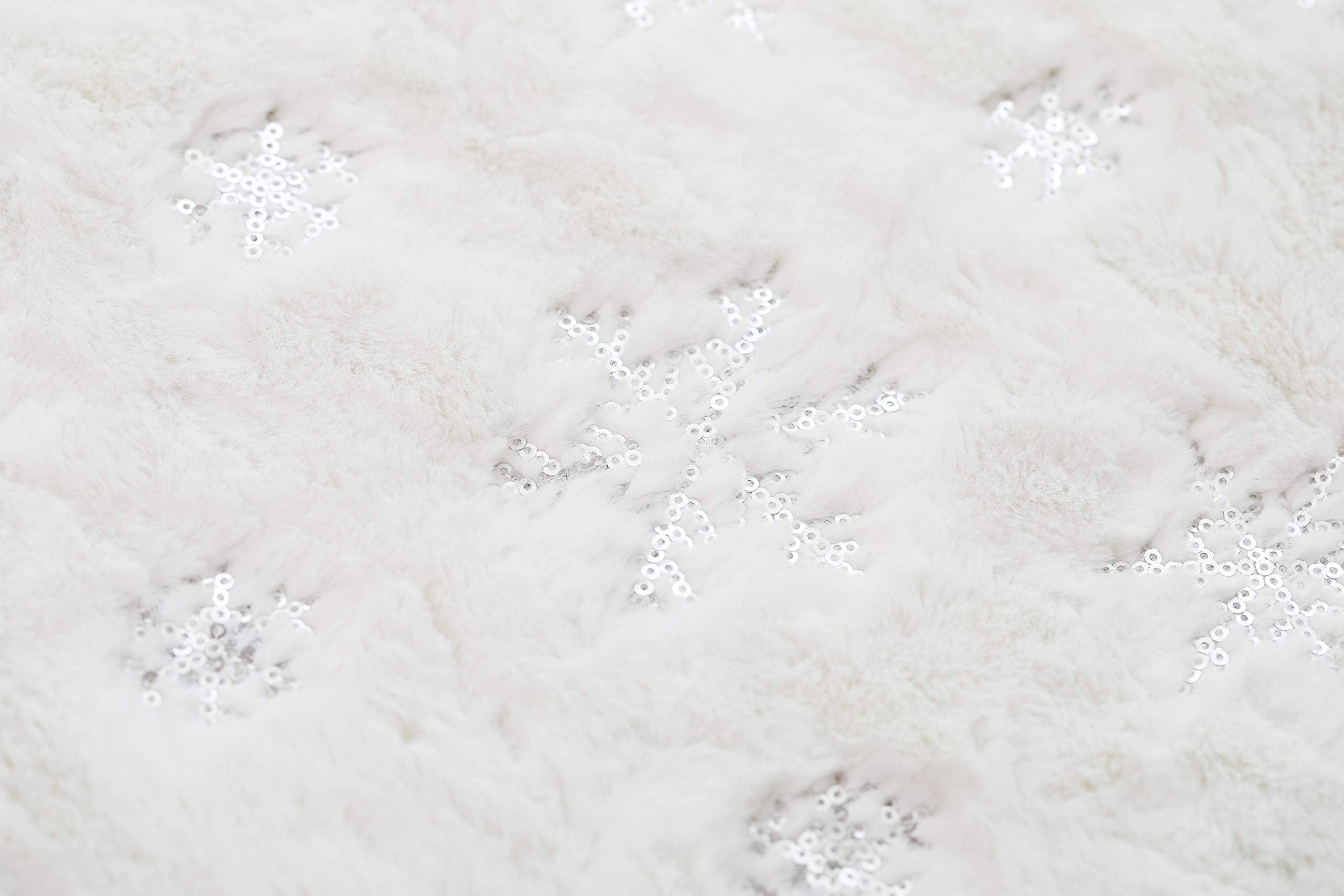 Kaximd embroidered snowflake detail showing craftsmanship and festive accent