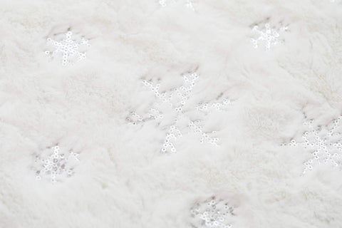 Kaximd embroidered snowflake detail showing craftsmanship and festive accent