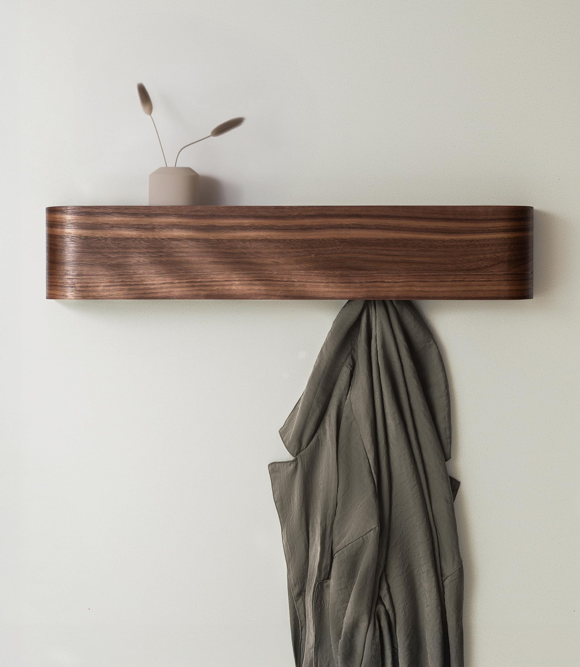 Kazai Toke front view walnut showing slim profile and tidy storage benefit