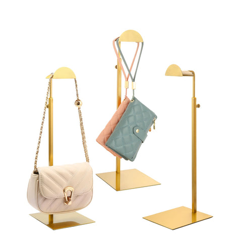 KDYZS+ front view of three gold purse display stands for polished merchandising