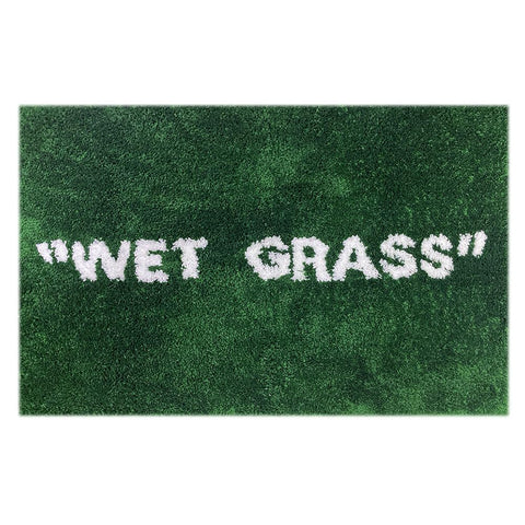 KEEP OFF front view of green wet grass rug shows bold design and soft texture