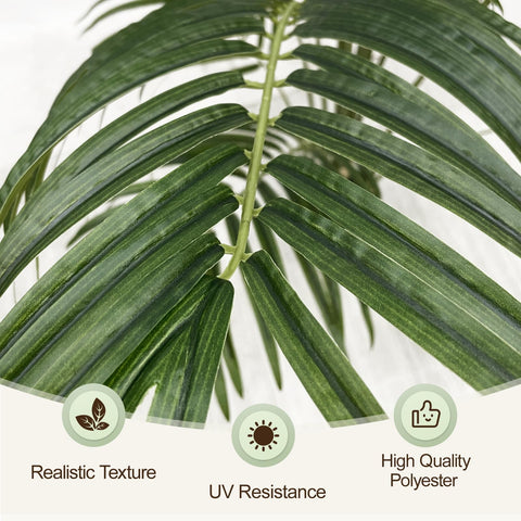 Keeplush palm next to sofa demonstrates true 5ft scale and presence