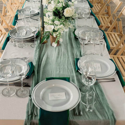 KEEPSHOWING runner layered with florals for styled centerpiece appeal