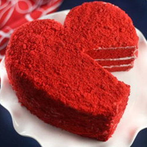 kefyixc heart pan holding a freshly baked cake ready for decorating