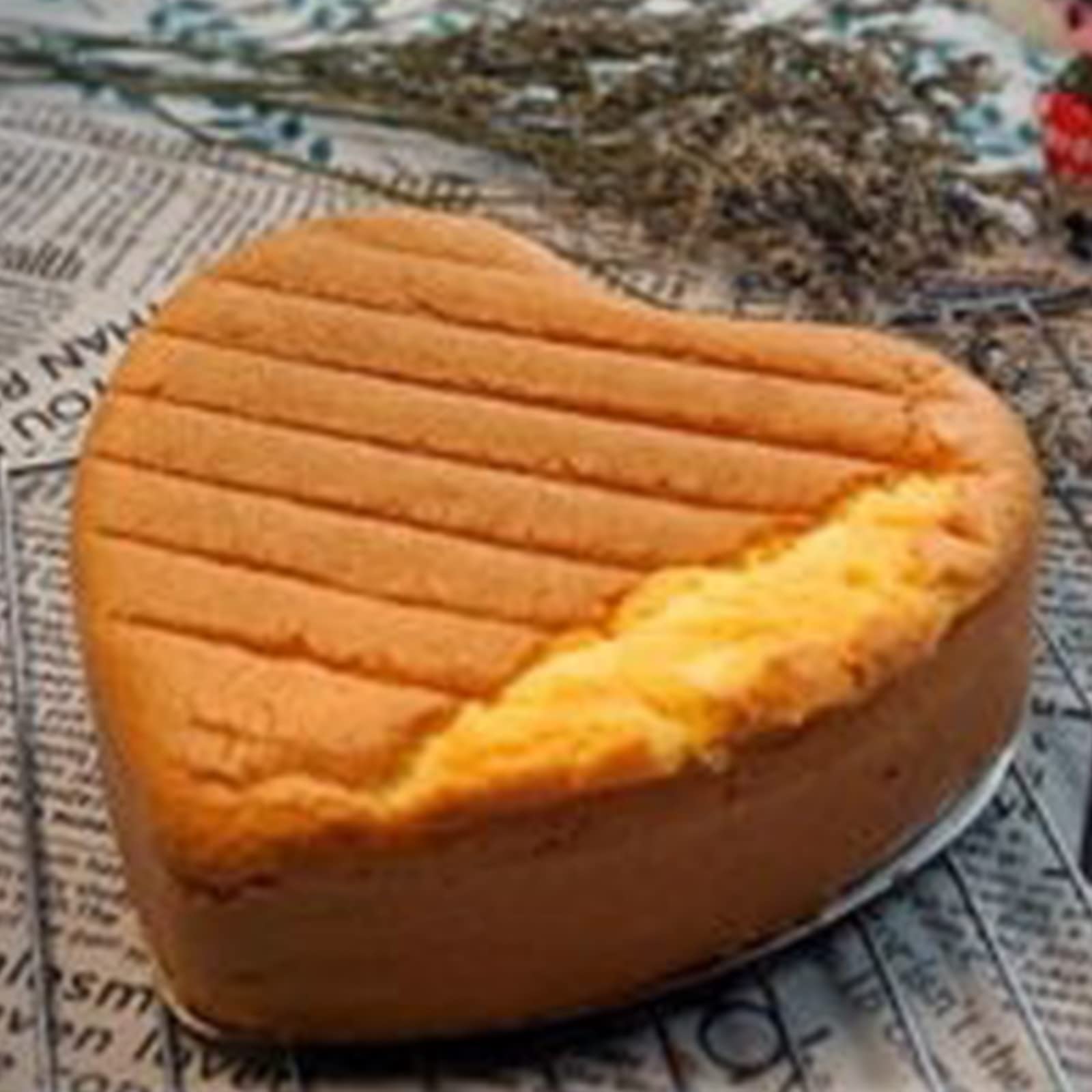 kefyixc decorated heart cake on table demonstrating party presentation use