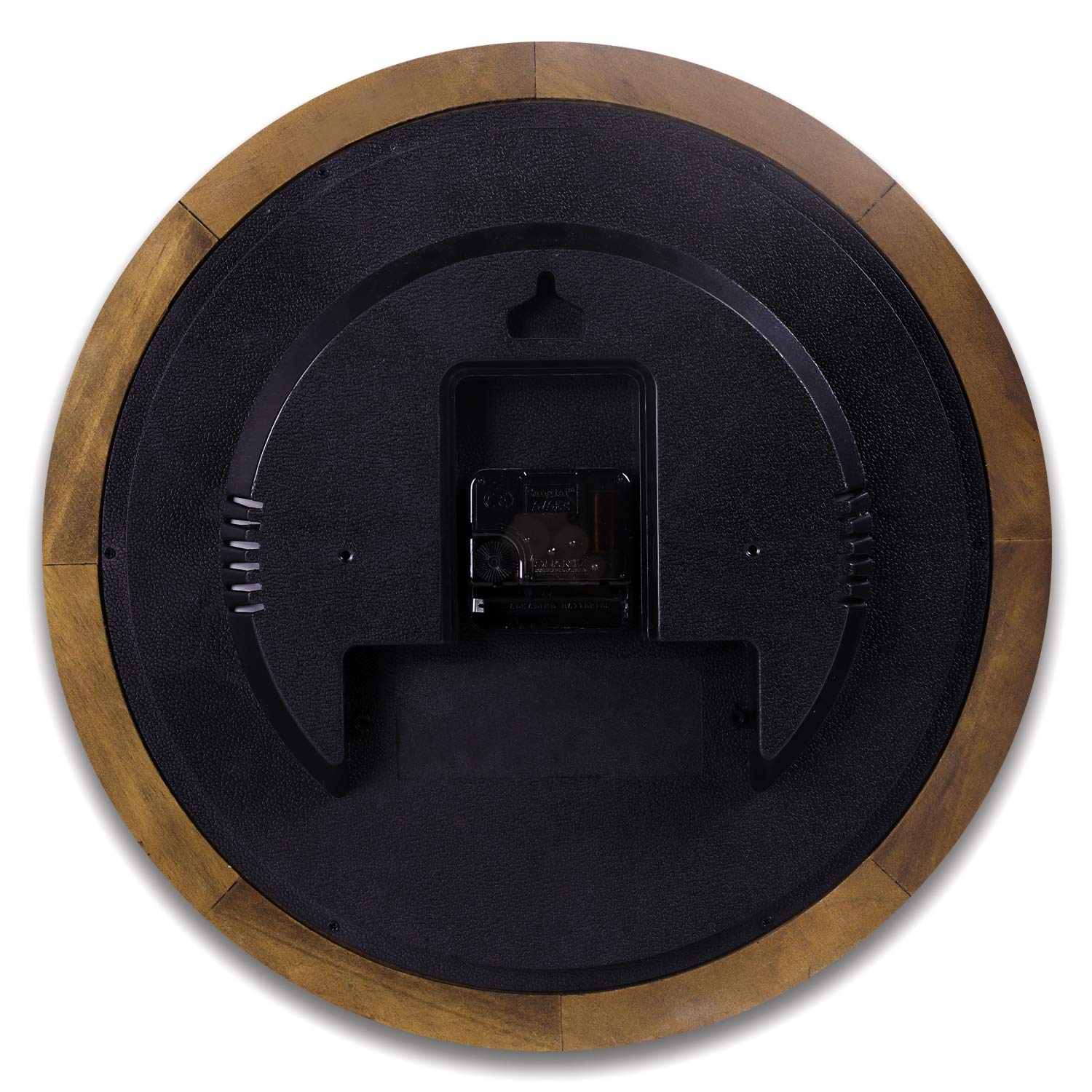 Kesin clock beside a chair showing 14-inch scale and room-appropriate size