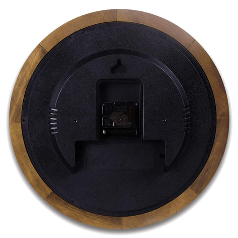 Kesin clock beside a chair showing 14-inch scale and room-appropriate size