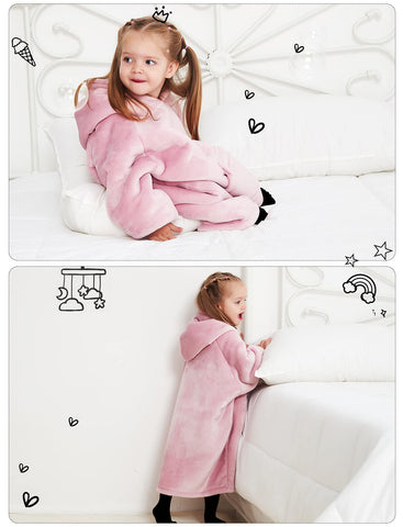 Child wearing KFUBUO hoodie blanket in living room for relaxed play