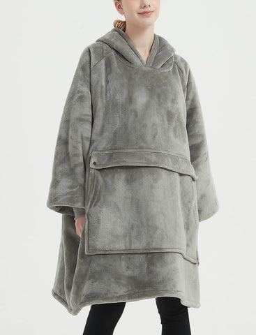 KFUBUO wearable blanket hoodie at a campsite illustrating outdoor warmth and versatility