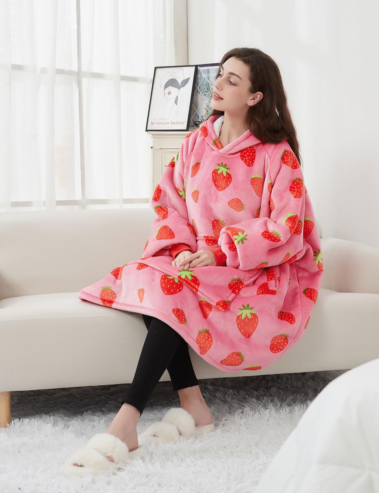 KFUBUO lifestyle size and drape showing blanket hoodie coverage on sofa