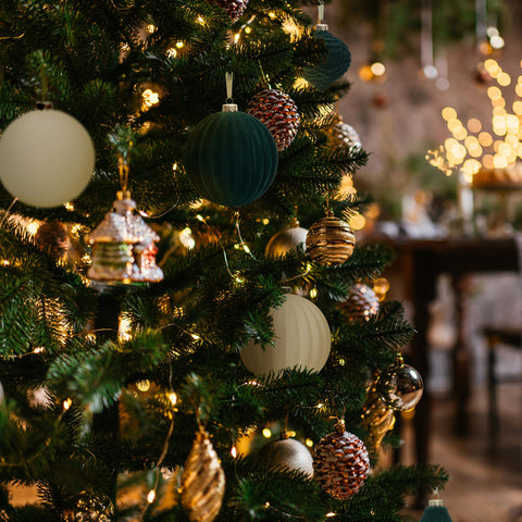 KI Store hanging on decorated tree illustrating instant holiday styling benefit