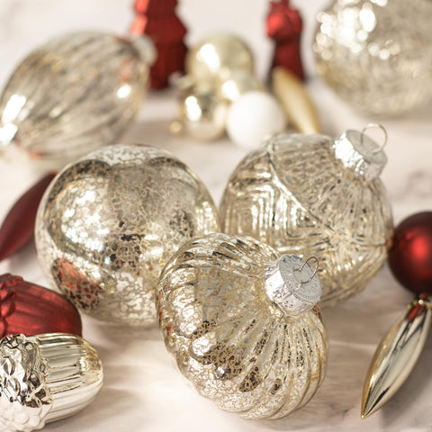 KI Store ornaments arranged in a centerpiece on table offering refined holiday styling