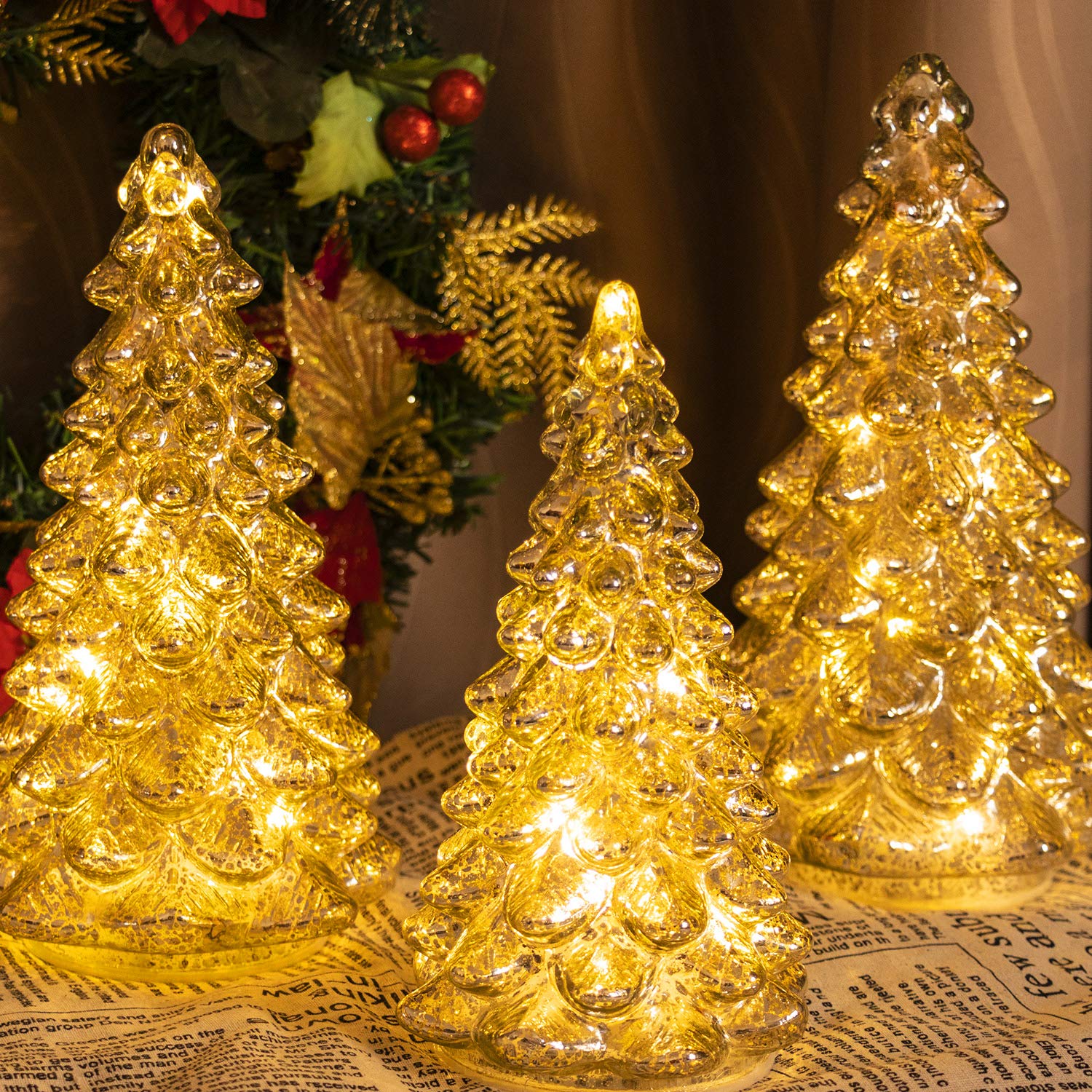 KI Store front view of three mercury glass trees showing elegant golden glow benefit