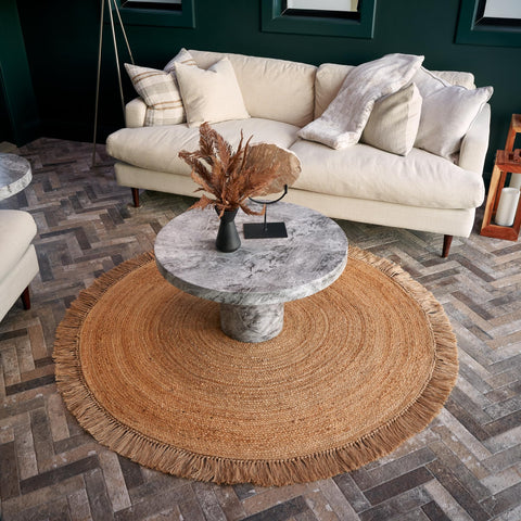 KIBAGA rug size comparison with chair showing 5x5 ft scale for room planning