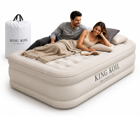 King Koil mattress next to chair for scale and elevated bed height