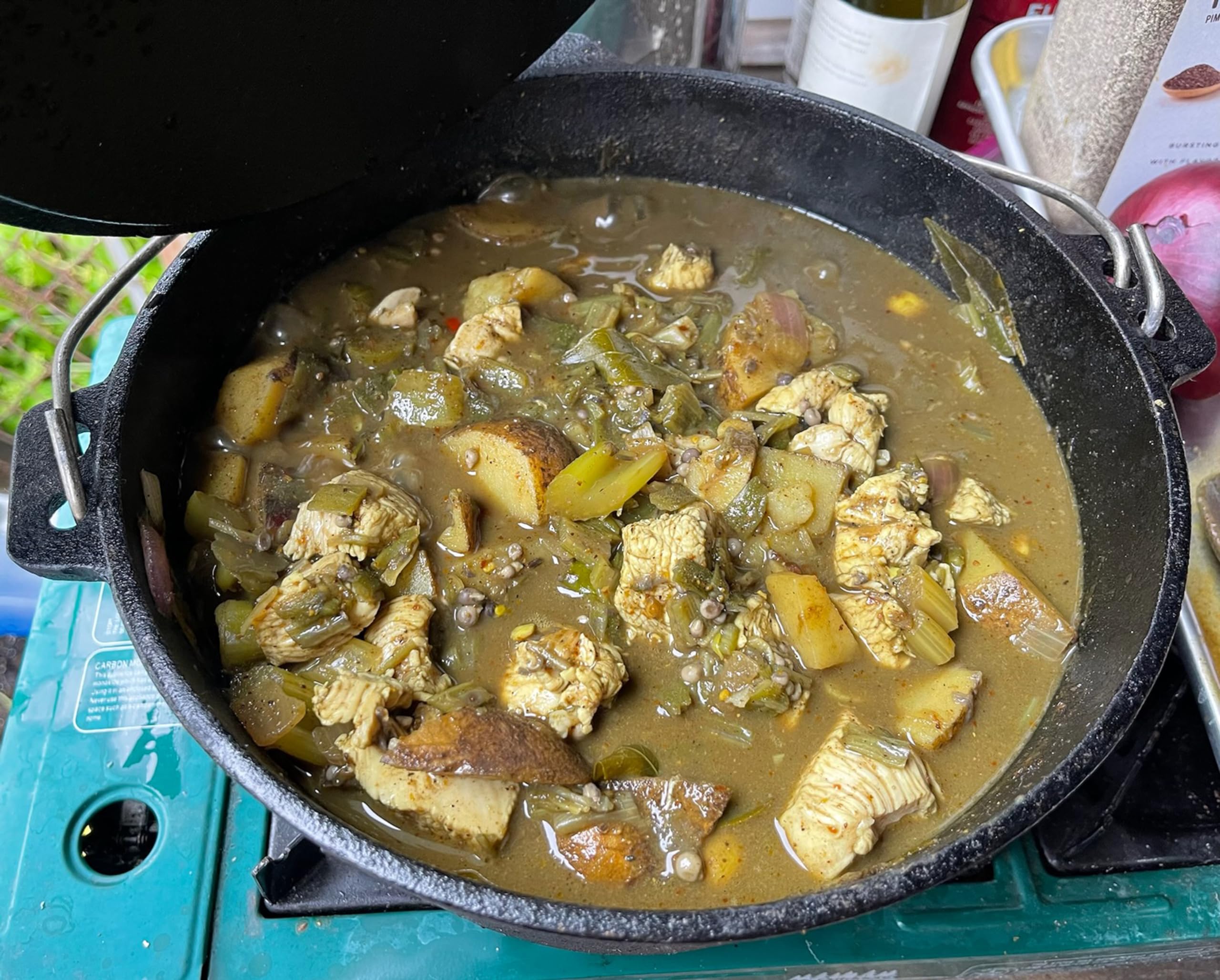 King Kooker next to vegetables for scale showing large 16 qt capacity benefit
