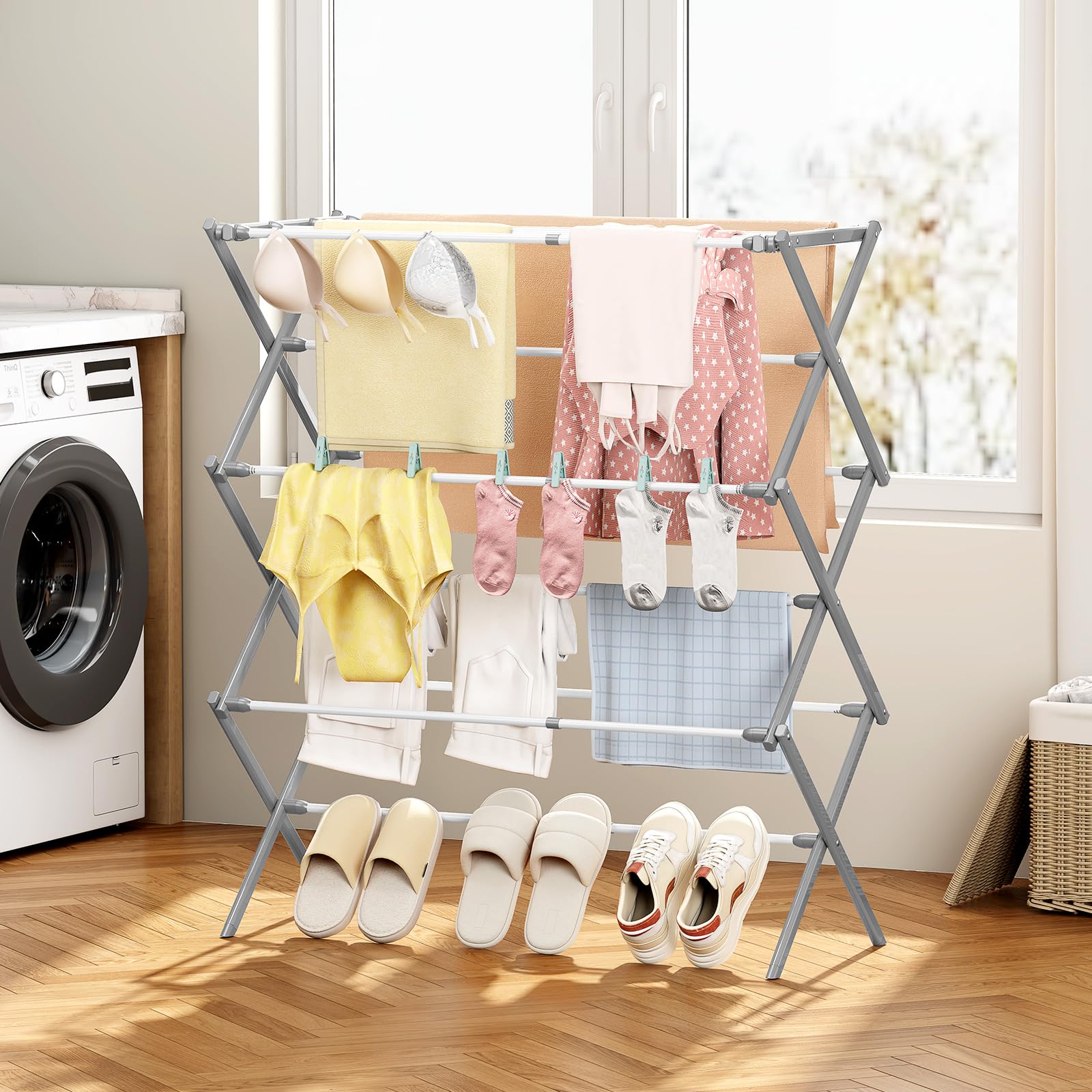 KINGBOARD holding delicates and baby clothes showing gentle drying benefit
